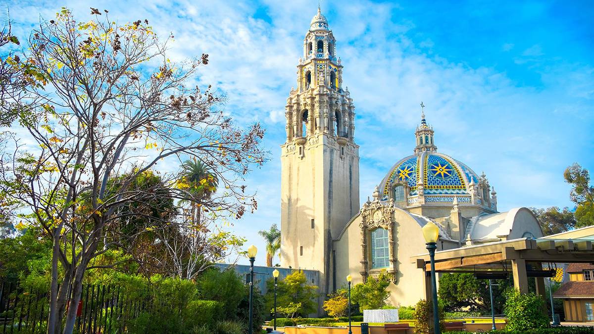 Distant ground view of California Tower and The Old Globe in Balboa Park on a sunny day in San Diego, California, USA